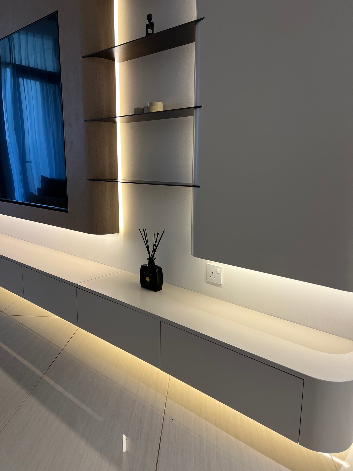Modern interior with ceiling lights and wall fixtures