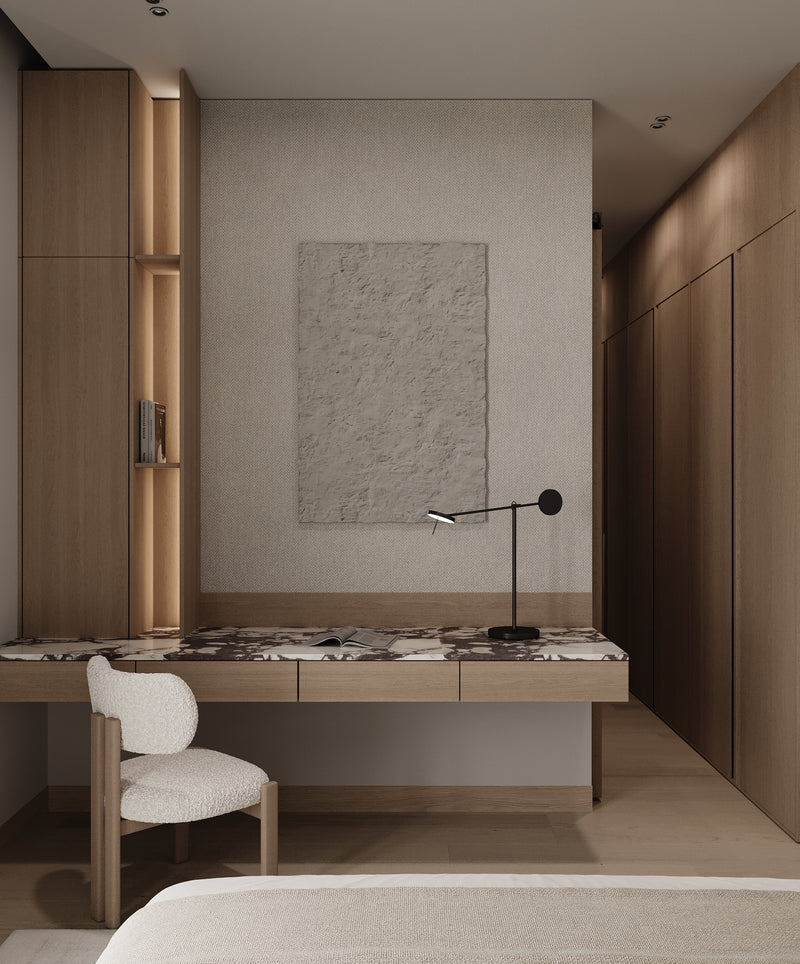 Modern bedroom with a bed, desk, and wall art.