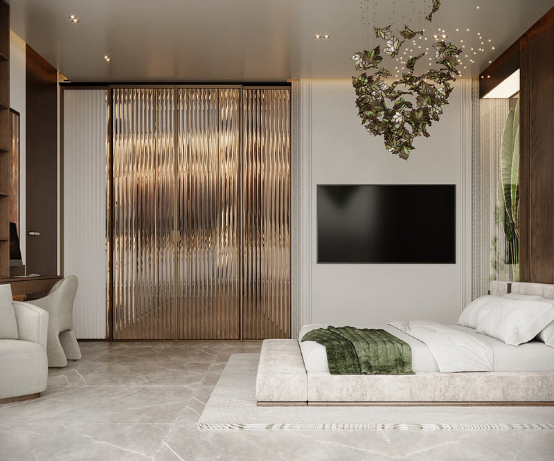 Modern master  bedroom with a bed, television, and decorative wall art.