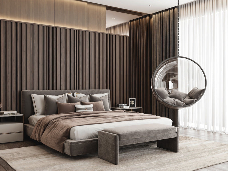 Modern master bedroom with a large bed, side tables, and decorative pillows.