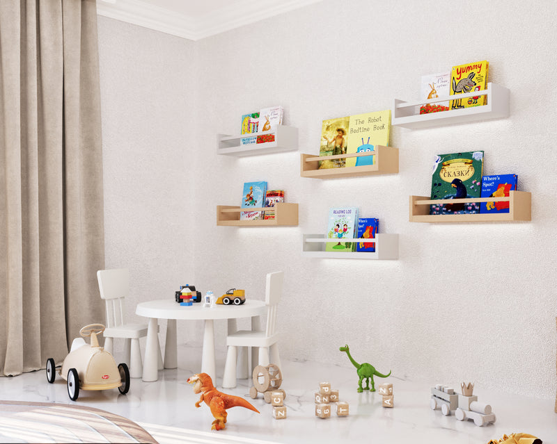 boy bedroom with shelves, books, and toys on a white wall.