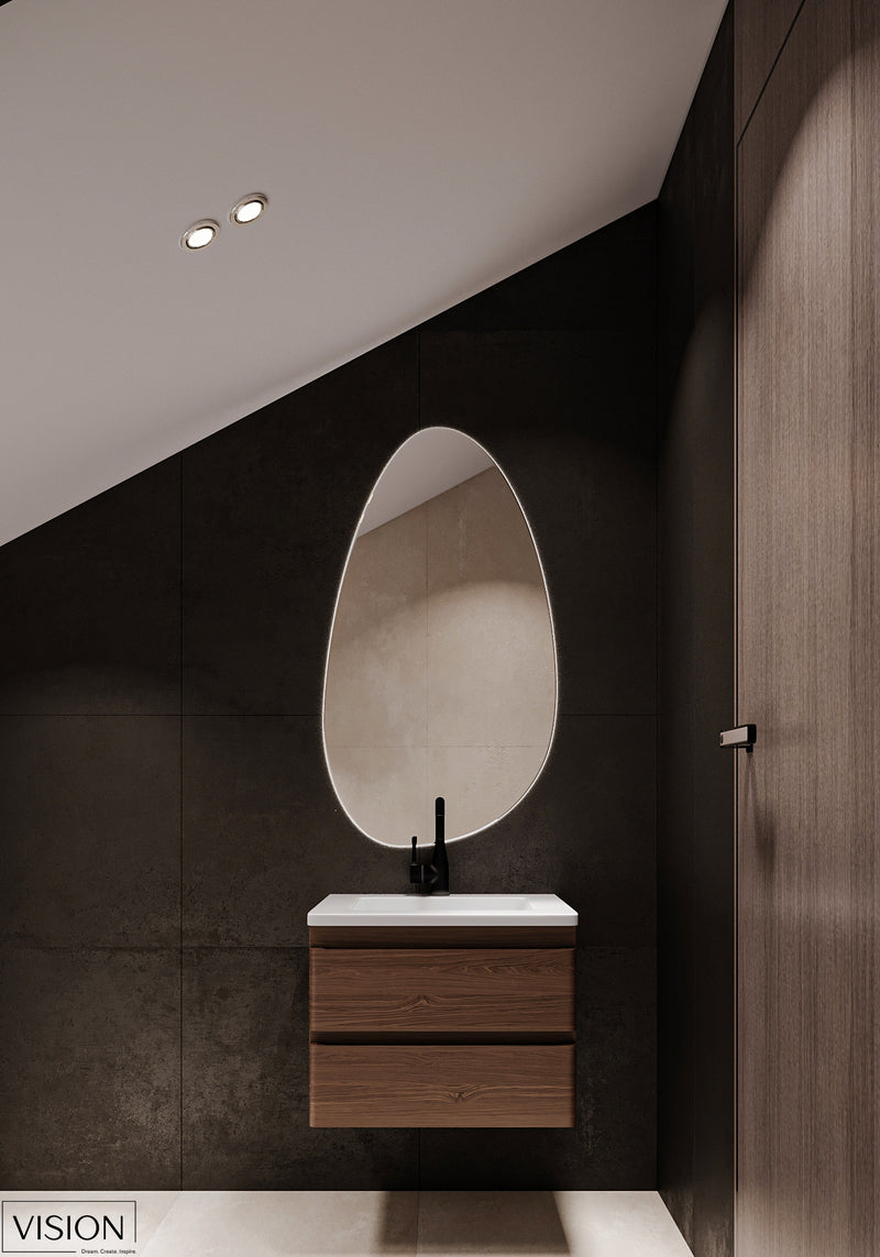 Modern bathroom with a wooden vanity and oval mirror against a dark wall.