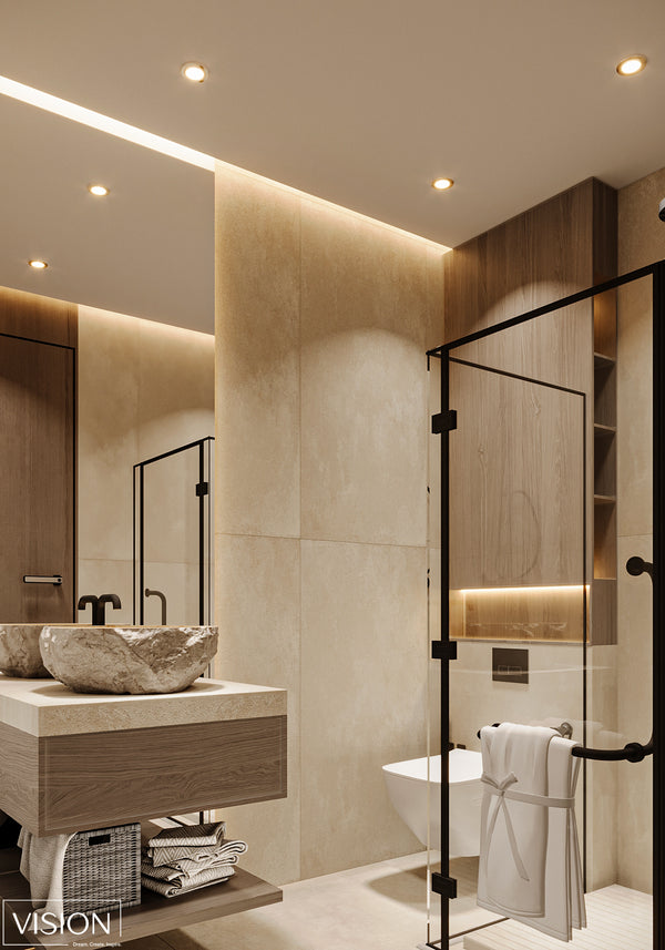 Modern bathroom with beige tiles, a sink, and a shower area.