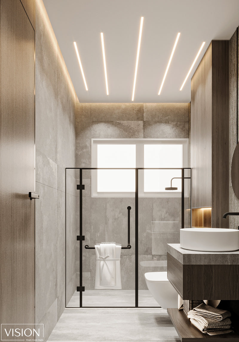 Modern bathroom with glass shower enclosure, sink, and towel.