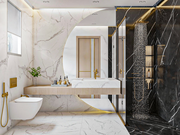 Modern bathroom with marble walls and floor, gold fixtures, and a chandelier.