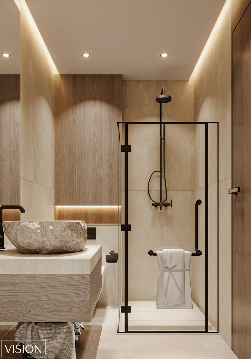 Modern bathroom with shower enclosure, sink, and towel.