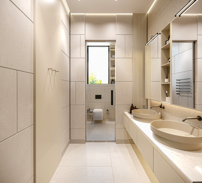 Modern bathroom with white tiles, a vanity, and a shower area.