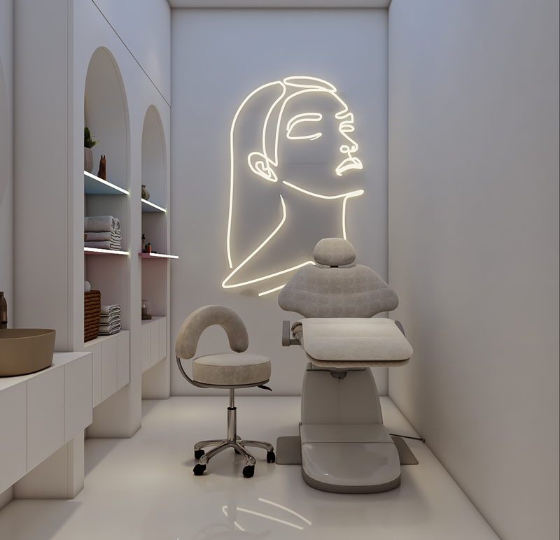 Modern beauty salon interior with a neon light and massage chair.