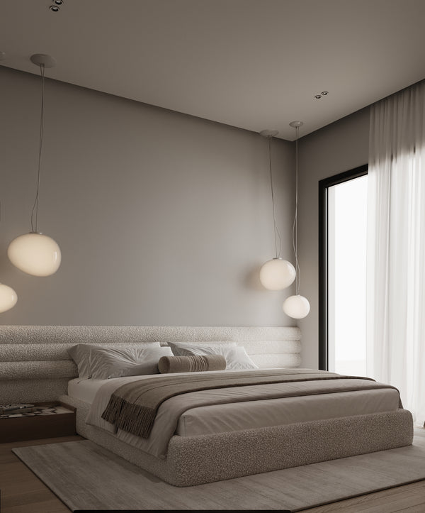 Modern bedroom with a bed, lamps, and large window.