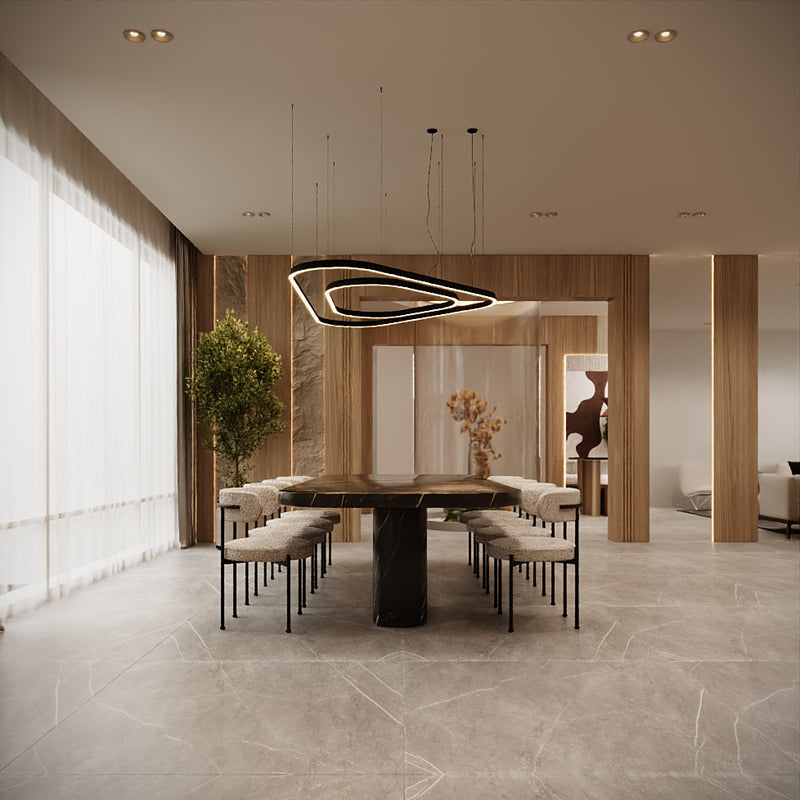 Modern dining area with a round table and chairs in a stylish interior setting.