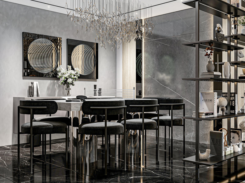 Modern dining room with black chairs, white table, and decorative elements.