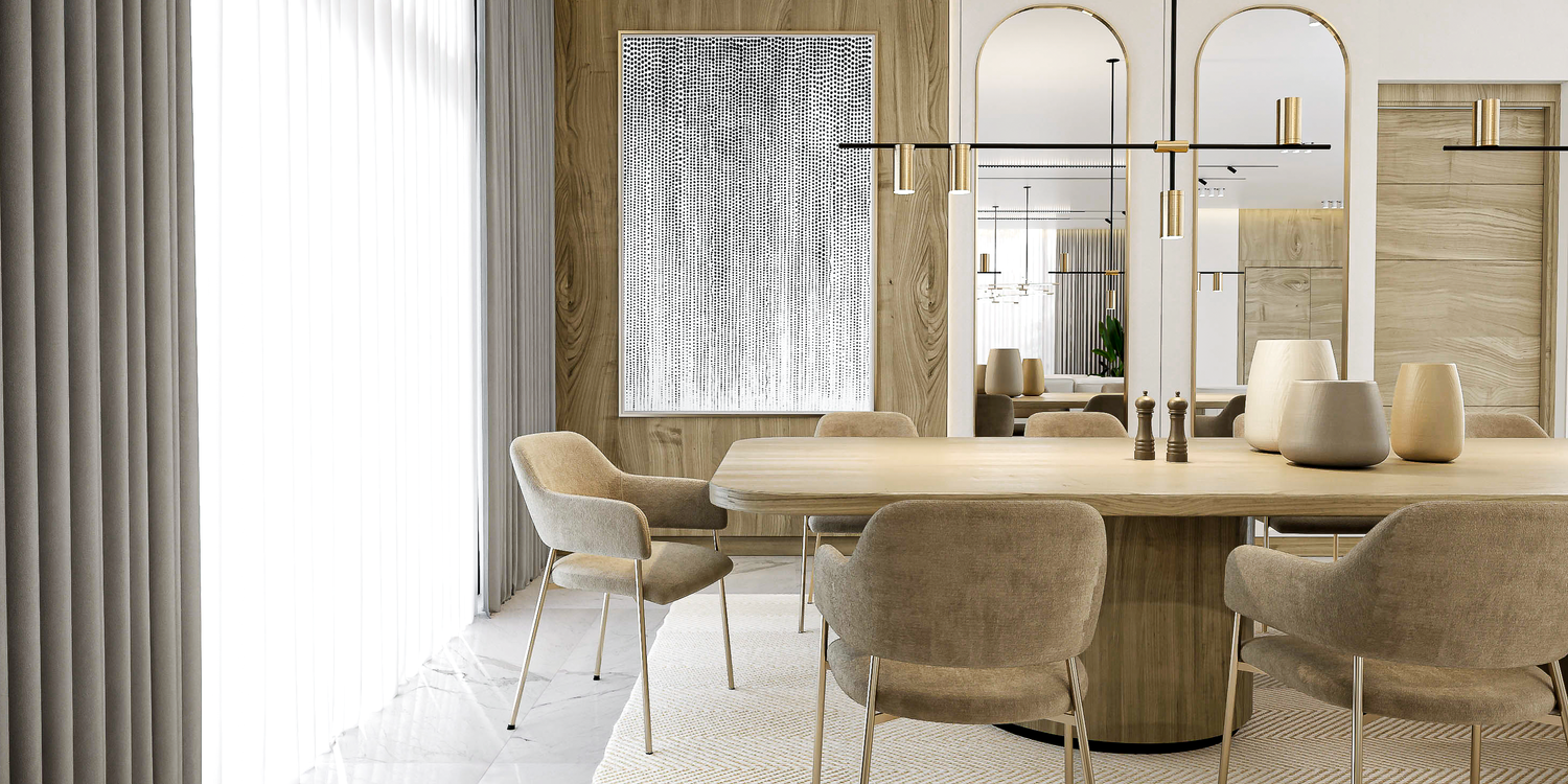 Modern dining room with a long table and chairs, featuring neutral tones and stylish decor.