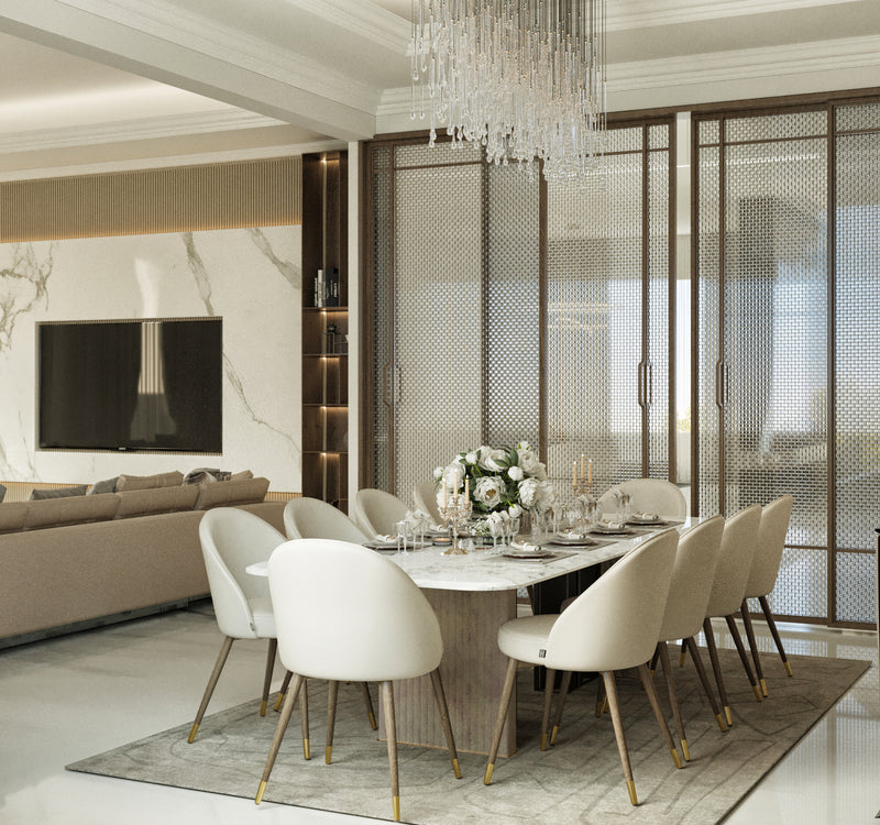 Modern dining room with a table and chairs in a stylish interior setting.