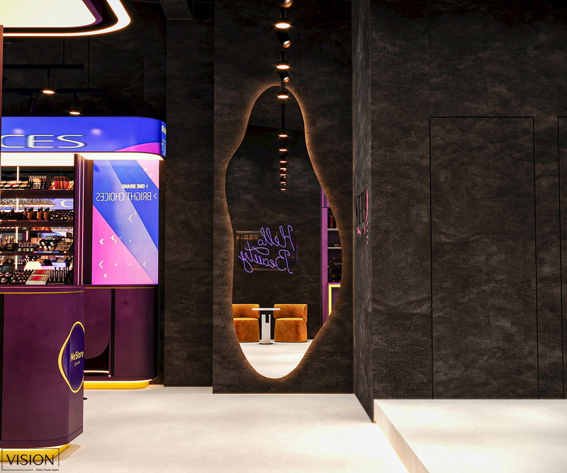 Modern interior design with a large mirror reflecting a room with purple accents.