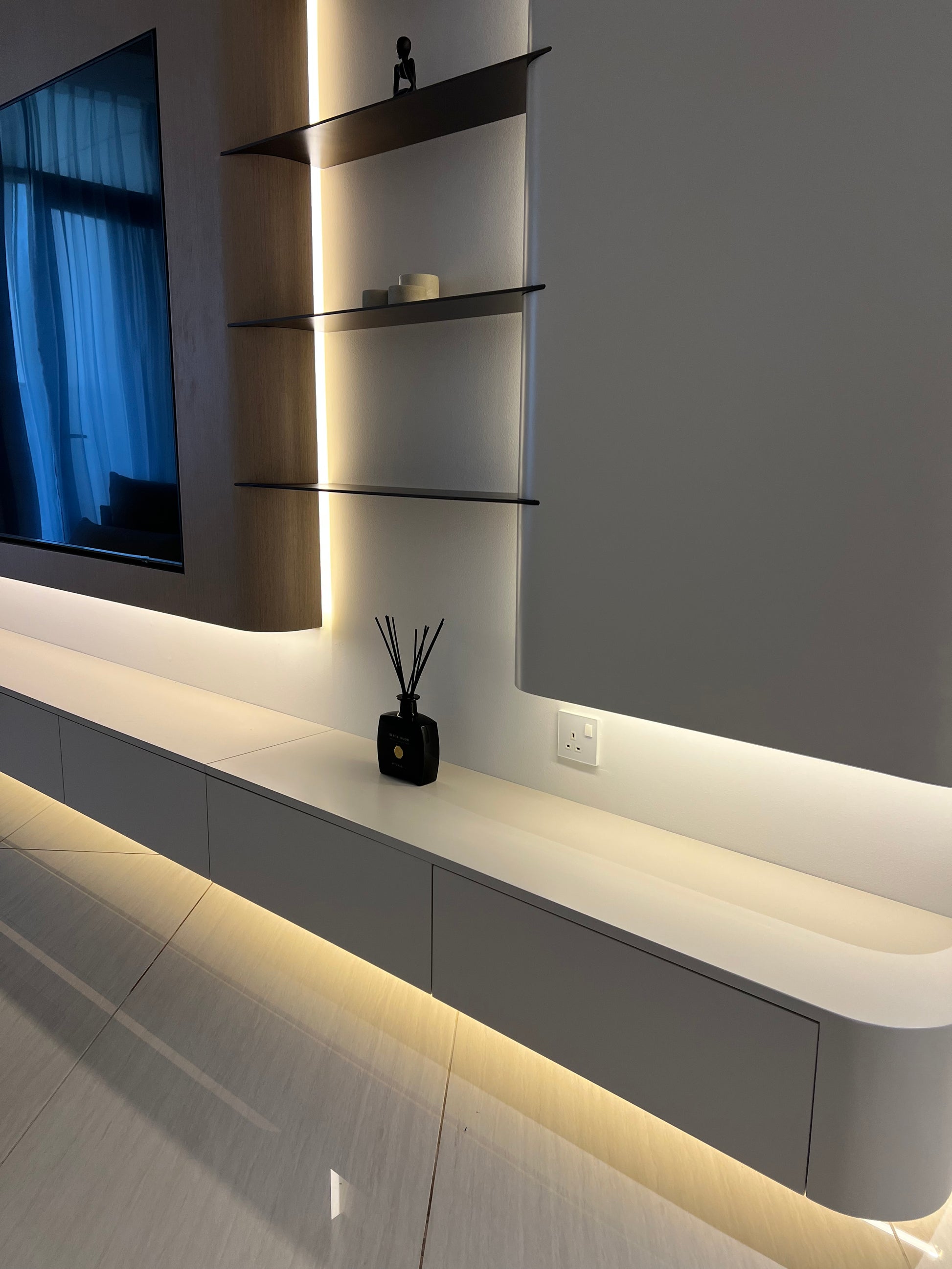 Modern interior with ceiling lights and wall fixtures