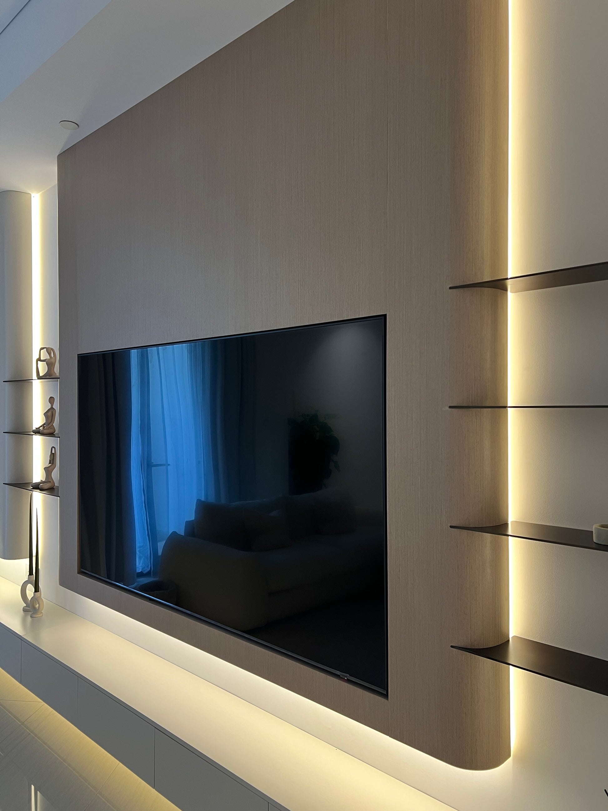 Modern kitchen with a built-in cooktop and ceiling lights
