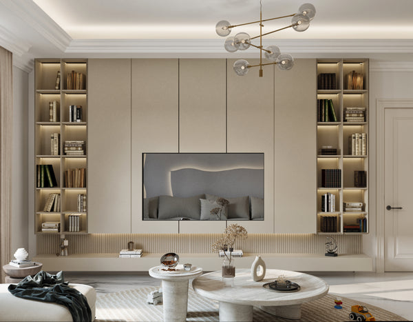 Modern living room with a television mounted on a wall between two bookshelves.
