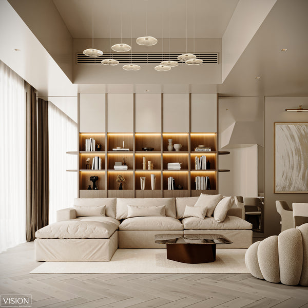 Modern living room with a beige sectional sofa, wooden coffee table, and shelves with decorative items.