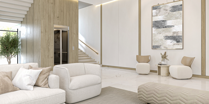 Modern living room with white furniture and abstract art on the wall