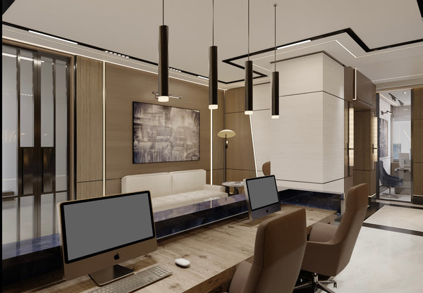 Modern office interior with a desk, computer monitors, and chairs.