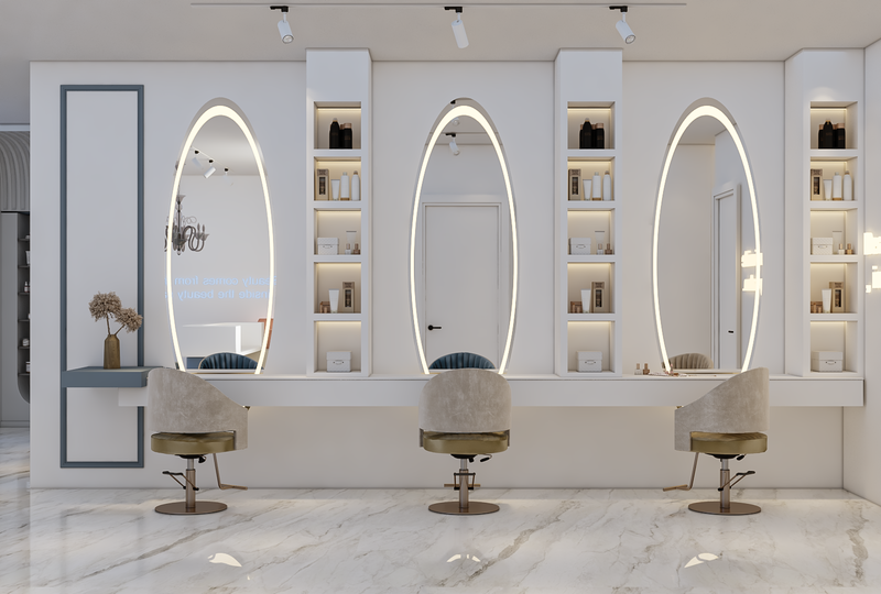 Salon interior with three oval mirrors and matching chairs.