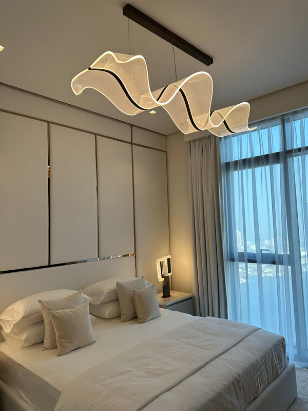 best Luxury apartment interior with sheer curtains, a unique spiral chandelier, and a neutral, plush aesthetic dubai