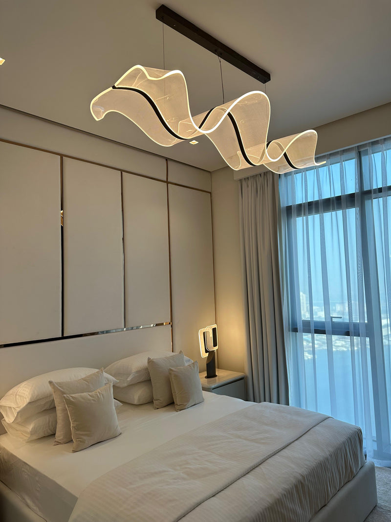 best Luxury apartment interior with sheer curtains, a unique spiral chandelier, and a neutral, plush aesthetic dubai