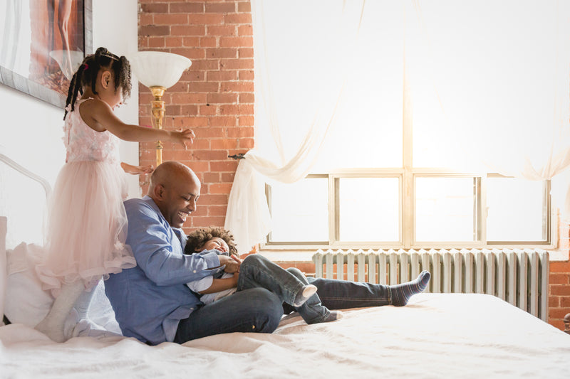 father-having-lots-of-fun-with-his-kids