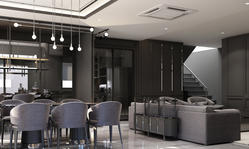 Luxurious open-plan villa interior featuring a modern living room and dark dining area with black paneling and sleek gray furniture