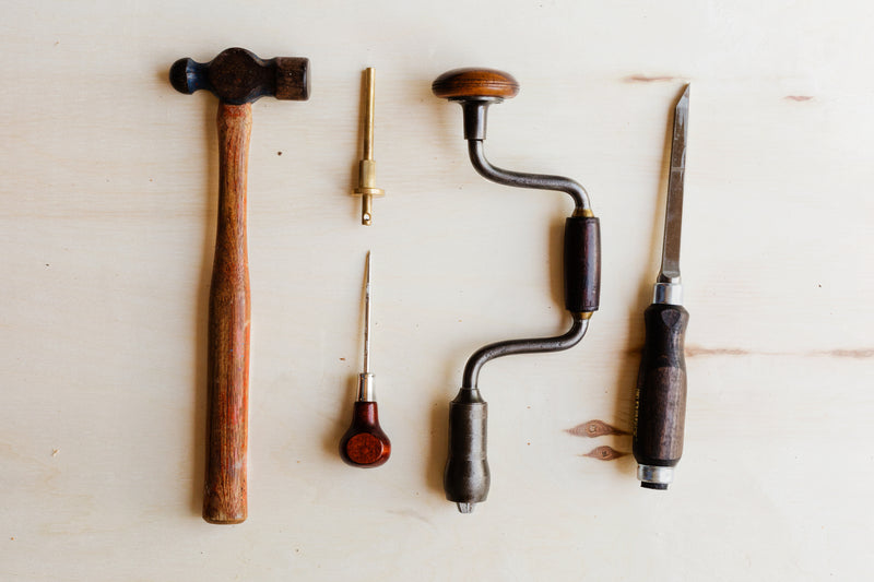 carpentry tools representing high-quality craftsmanship and bespoke fit-out services.